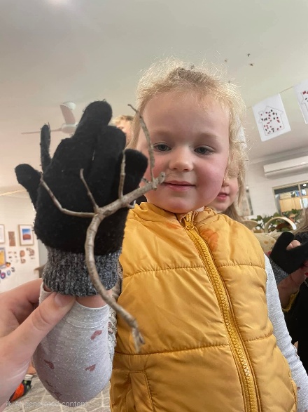 Child meeting a stick insect
